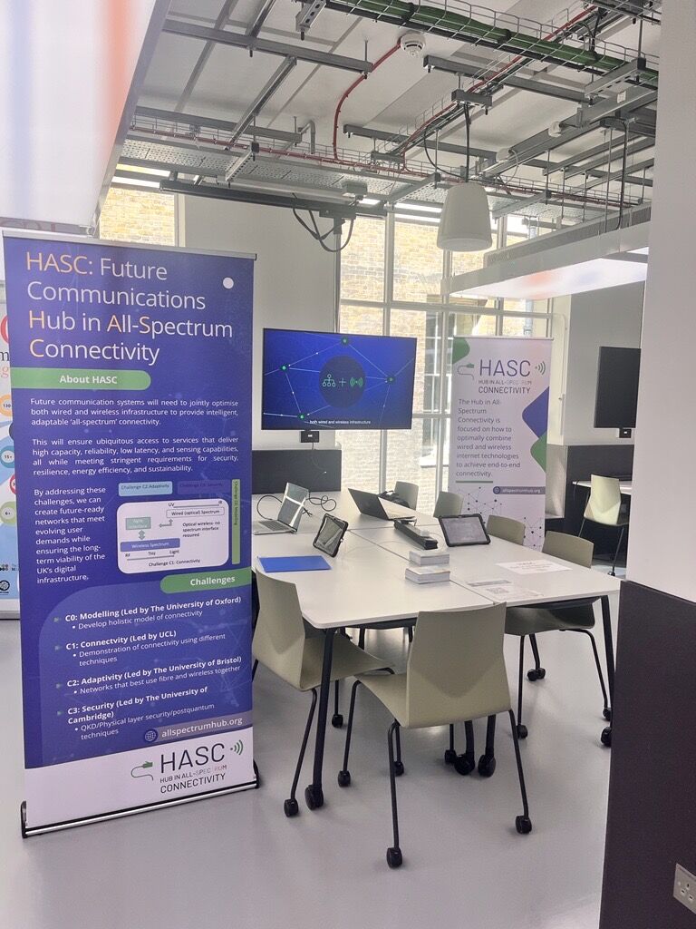 HASC's Branded Exhibition Space at IEEE DySPAN 2025 Including All Spectrum Banners & Display Monitor