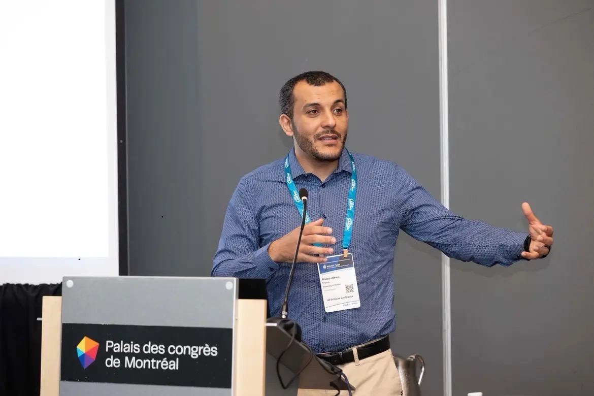 Abderrahmen Trichili presents Optical Wireless Channel Sounding in a Realistic Environment at IEEE ICC – Photo Credit: IEEE Communications Society